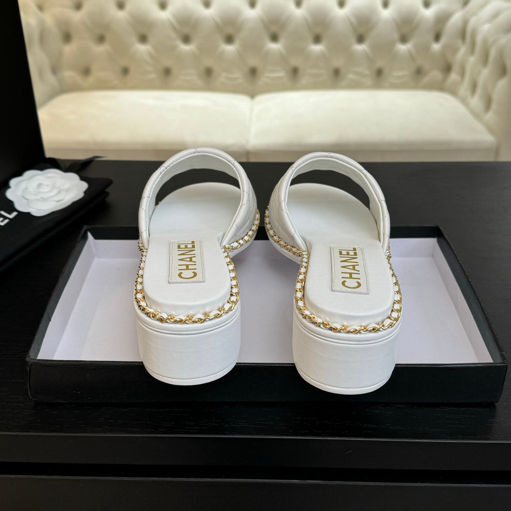 CHANEL HIGH FLATFORM SLIPPER IN WHITE EMBOSSED SHEEPSKIN