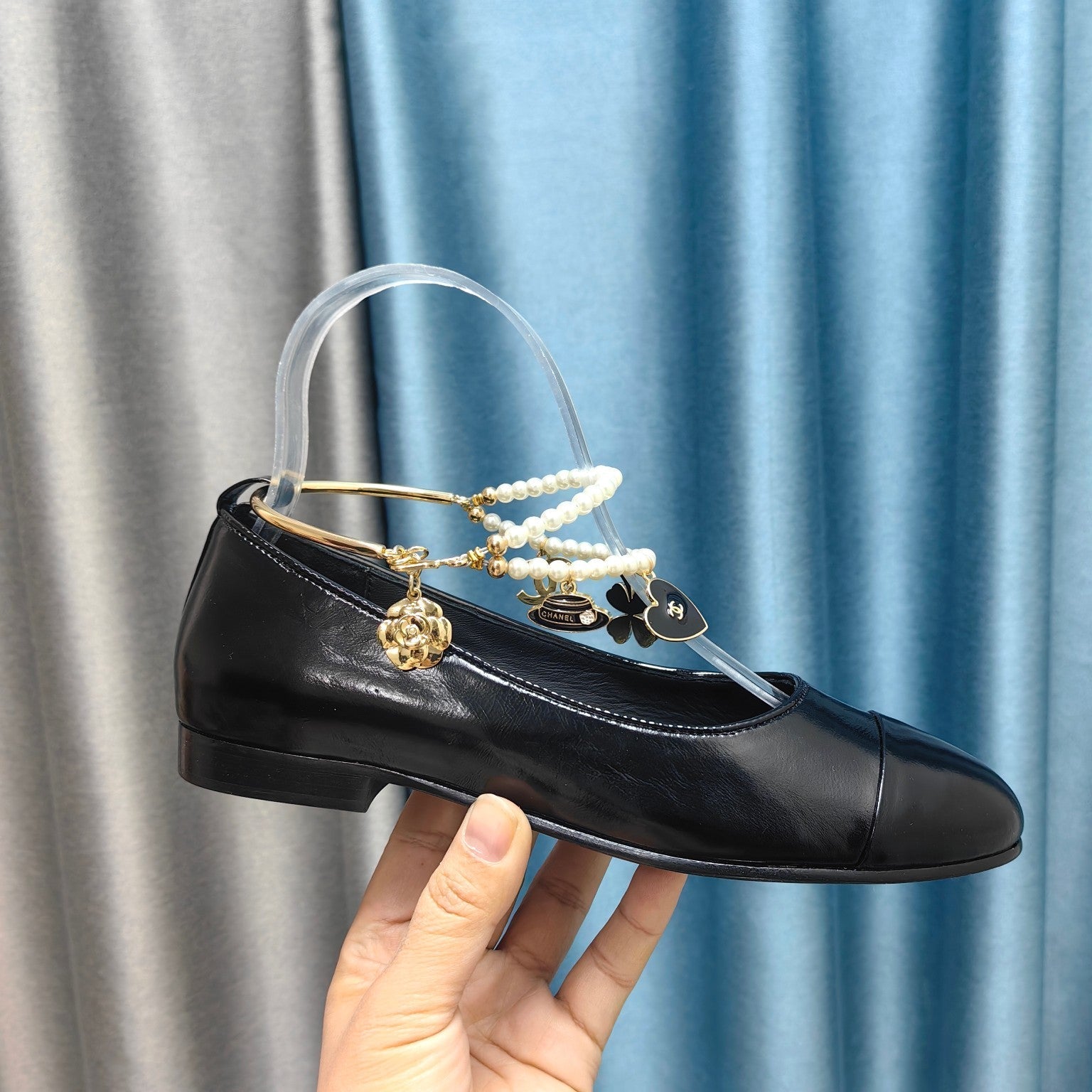 CHANEL MARY JANE WITH PEARL STRAP IN GLOSSY BLACK LAMBSKIN