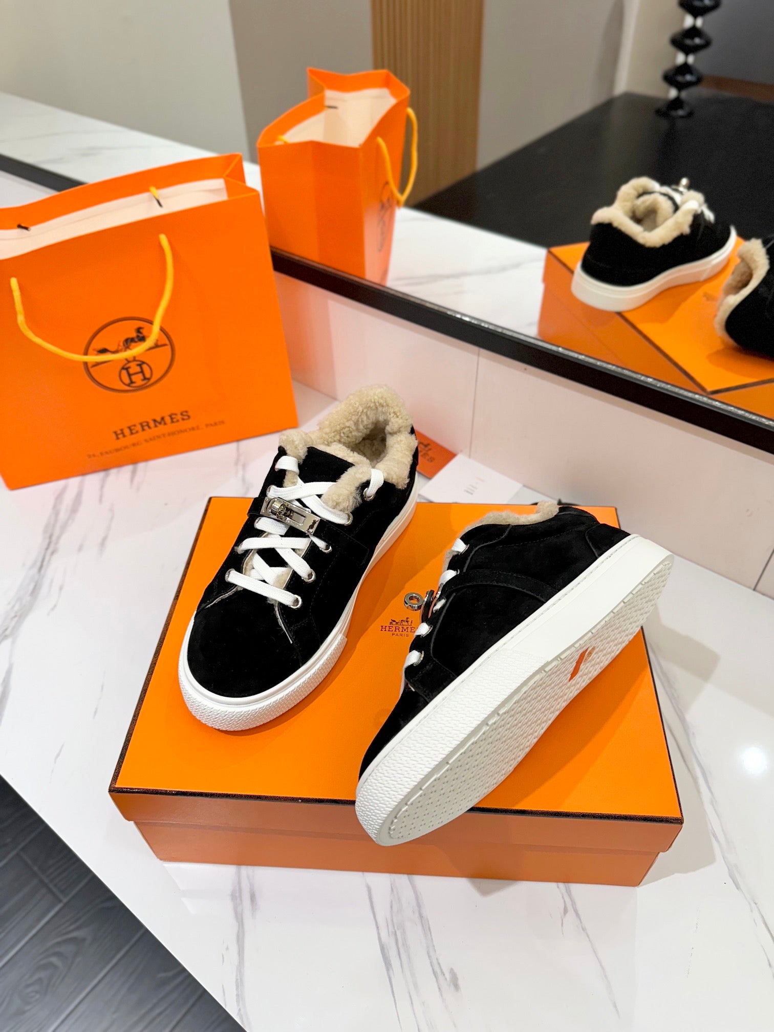 HERMES DAY SNEAKER IN BLACK SUEDE AND FLEECE LINING